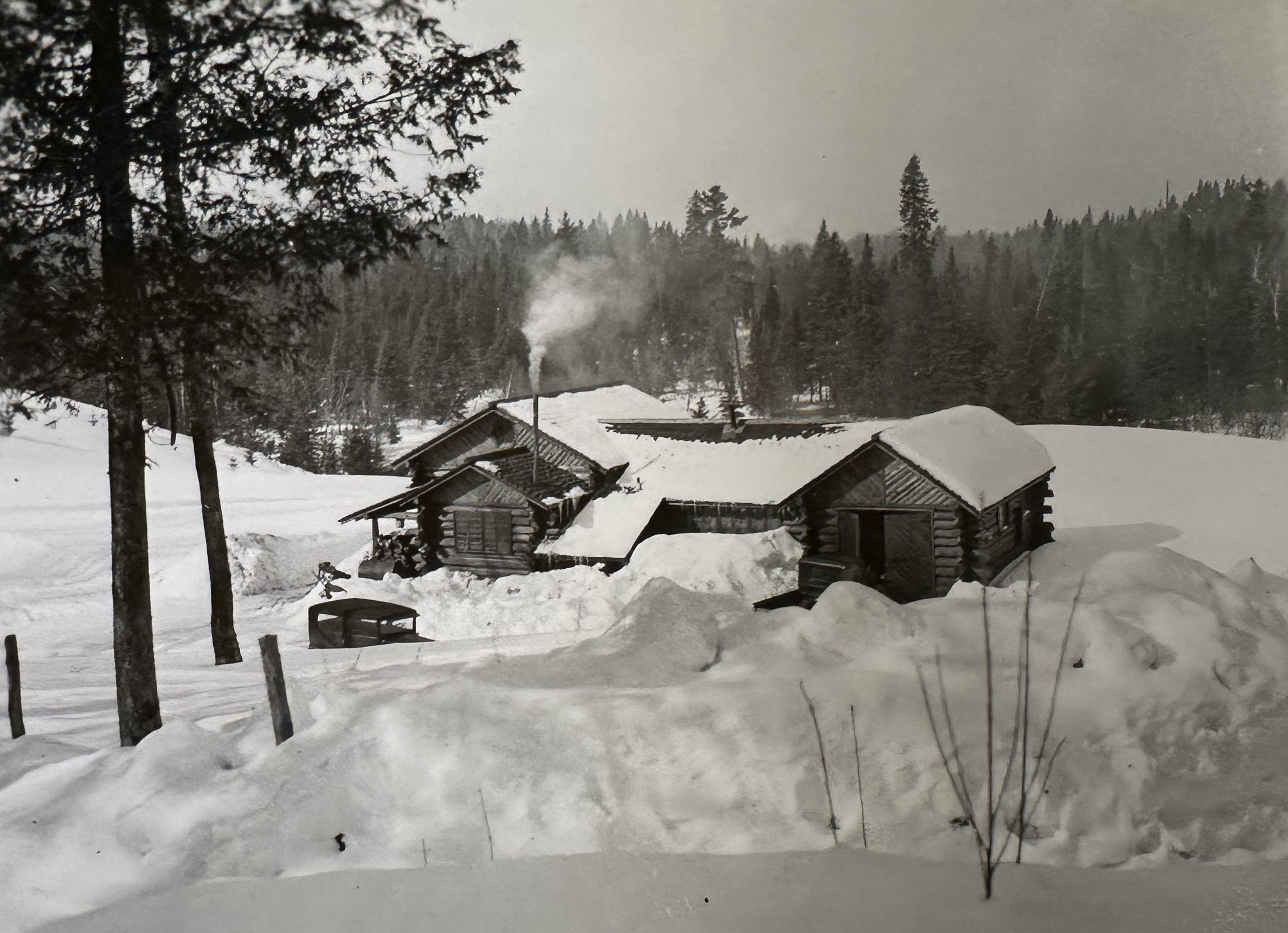 The caretaker’s cabin under deep snow in February 1935